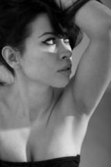 Fototapeta na wymiar sexy woman studio portrait intense look black and white