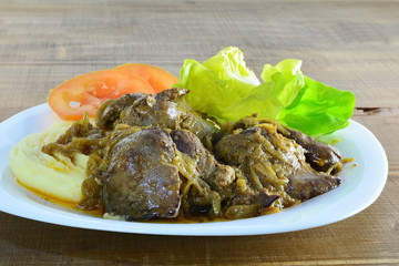 Pan fried chicken liver with onions