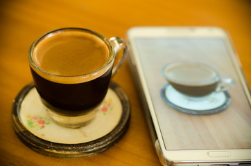Hot coffee and smart phone