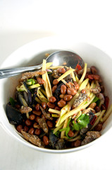 close up spicy mango salad with crab , asian style food