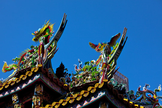 Colorful carvings on roof of Japanese temple in Yokohama
