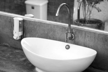 Faucetc and white sinks