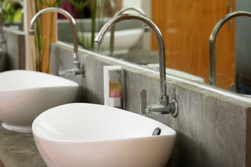 Faucetc and white sinks