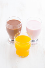 orange juice, chocolate milk and fruit yoghurt, vertical