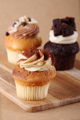 three cupcakes on plate