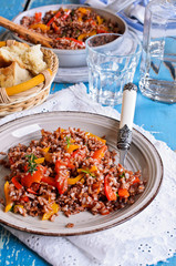 Rice red with paprika and thyme