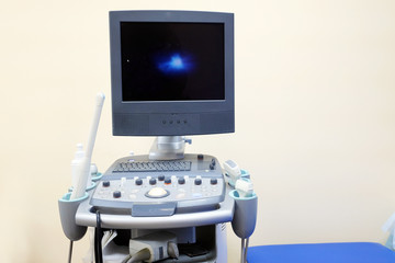 Interior of hospital room with ultrasound machine