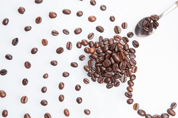 coffee beans with metal spoon