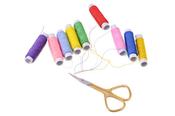 spools of thread and scissors