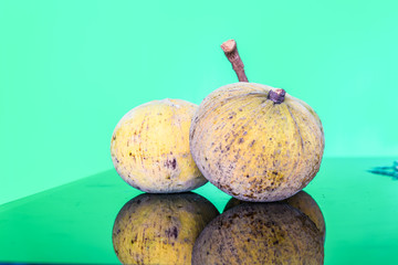 Santol-meliaceae fruit on green background