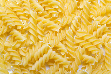 close up of raw spiral pasta