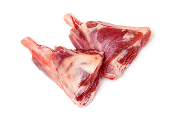 Goat meat shin joints isolated on a white background.