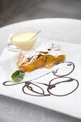 Apricot strudel with custard and mint