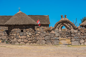 stone house in the peruvian Andes at Puno Peru