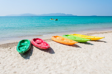 Colorful kayak on tropical beach