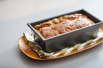 Closeup on baking dish with bread on table