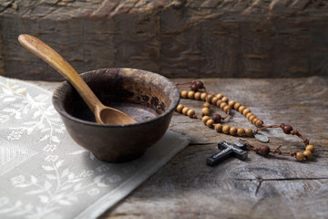 Fasting, Lent. Cup and cross. © vetre