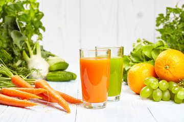 carrot juice on white wood  background