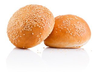 Two sandwich bun with sesame seeds isolated on white background