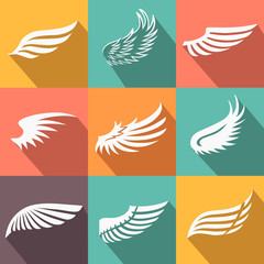 Fototapeta na wymiar Abstract feather angel or bird wings icons set isolated