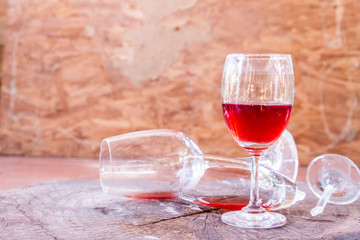 red wine on wooden background still life image