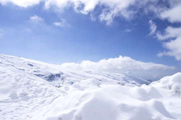 Panorama of Snow Mountain Range Landscape with Blue Sky