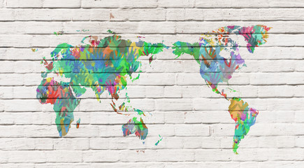 World map with hands in different colors