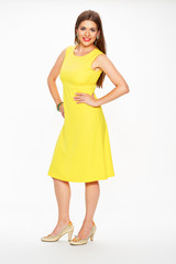 Fashion woman in yellow dress.