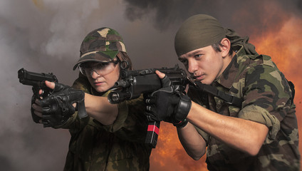 Portrait of soldiers up in arms