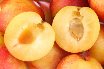 background of red and yellow plums