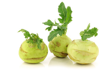 fresh kohlrabi cabbages on a white background