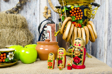 Nesting dolls at the samovar with bagels