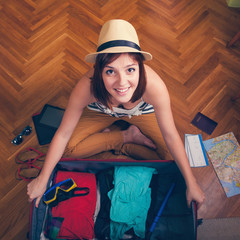 Packing Suitcase And Getting Ready For Traveling