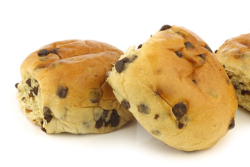 reshly baked traditional dutch buns with chocolate chips on a wh