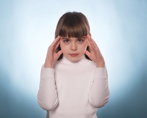 The expressive portrait of the young girl isolated