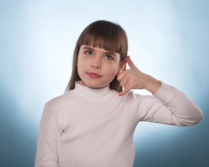 The young girl with the index finger down or up isolated