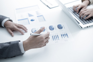 Business people discussing the charts and graphs showing the res