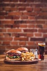 Fresh burger on wooden table.