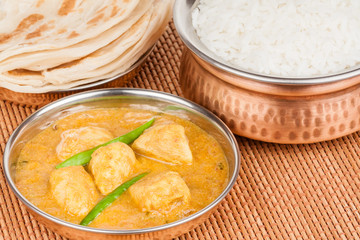 Indian Chicken Curry Meal with Rice and Parotta