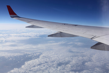 Obraz premium view from the airplane, wings sky