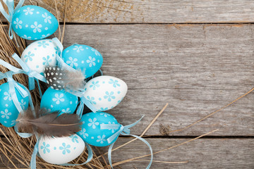 Easter eggs on wooden table background