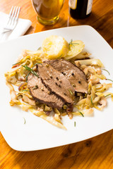 Roast beef with vegetable garnish