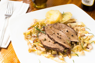 Roast beef with vegetable garnish