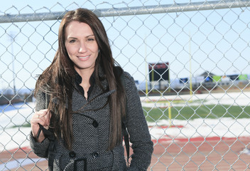 A Female student outside in the winter season