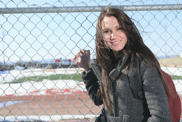 A Female student outside in the winter season