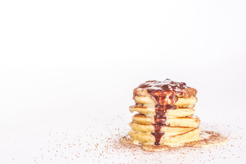 isolated stack of pancake with cocoa and chocolate
