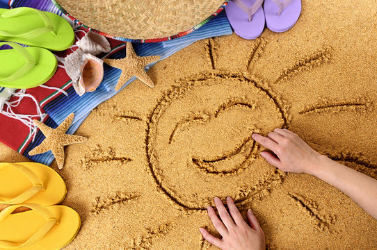 Mexico smiling beach sun child drawing in sand with sombrero photo