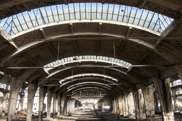 Old abandoned decayed grunge hall of vintage railway plant