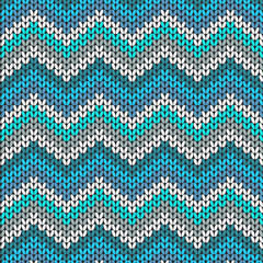 Knitted geometric pattern in blue, white and grey