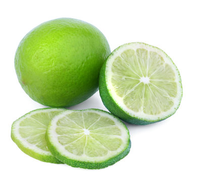 Two limes isolated on a white background
